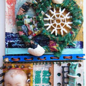 3D postcard A 3D postcard from found objects, mixed media, by Sue Murdoch